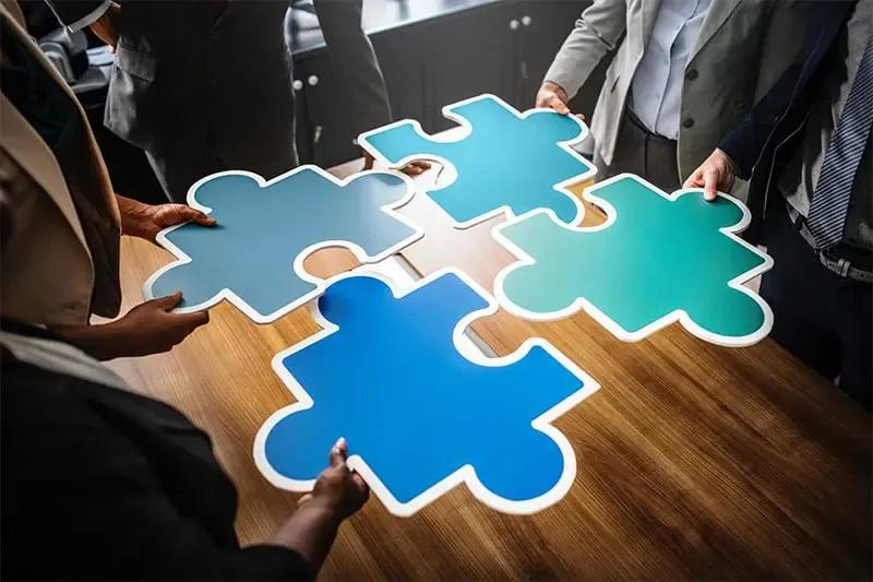 4 Forms of Cooperation in Business Management: Merger, Joint Venture, Consolidation, Franchise